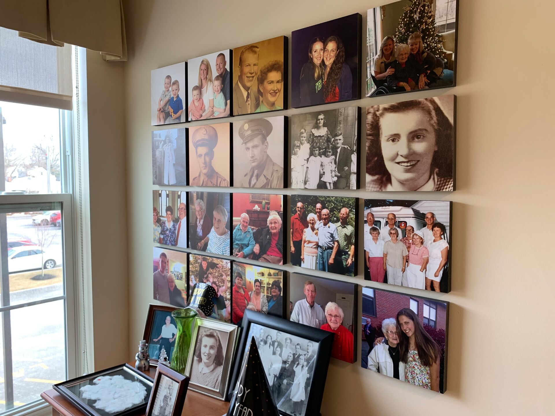 Collage wall of pictures from residents' lives.